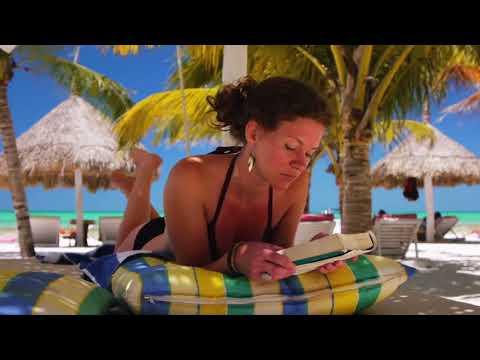 What&#39;s your idea of a good vacation?  A good book by the Caribbean!! - YouTube
